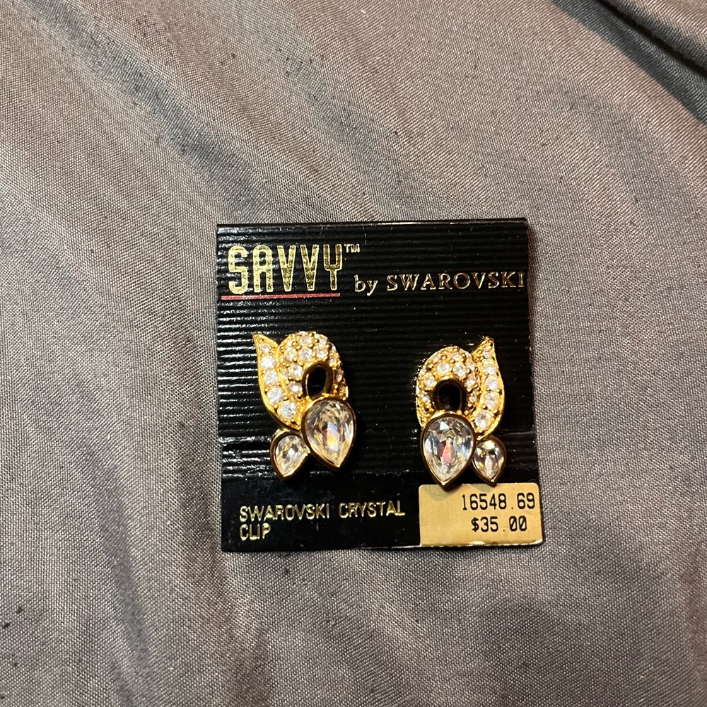 Gold and Silver clip on earrings by Swarovski